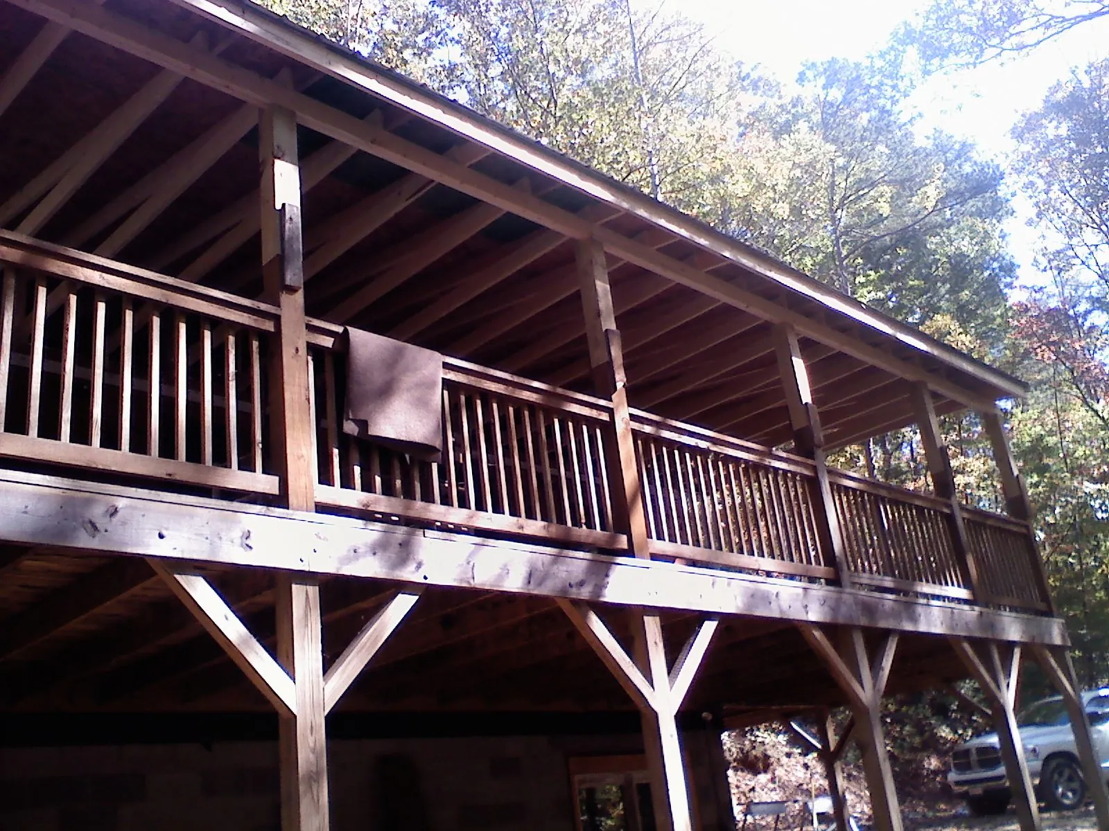 Timber framing under a new elevated porch and deck — Roof Leak Repair in Duluth by Roofing Brothers